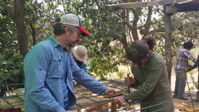 Pat and his wife Madeline build a rebar cage for cement platforms to hold a wash basin. The wash basin will be the source of water for a house.